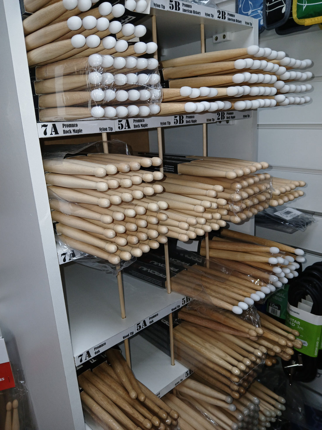 Various drum sticks showing different sizes, wood types and tip shapes for drummers